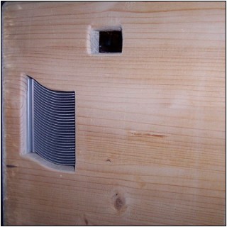 Passiv Cooler looking out of the front wooden plate